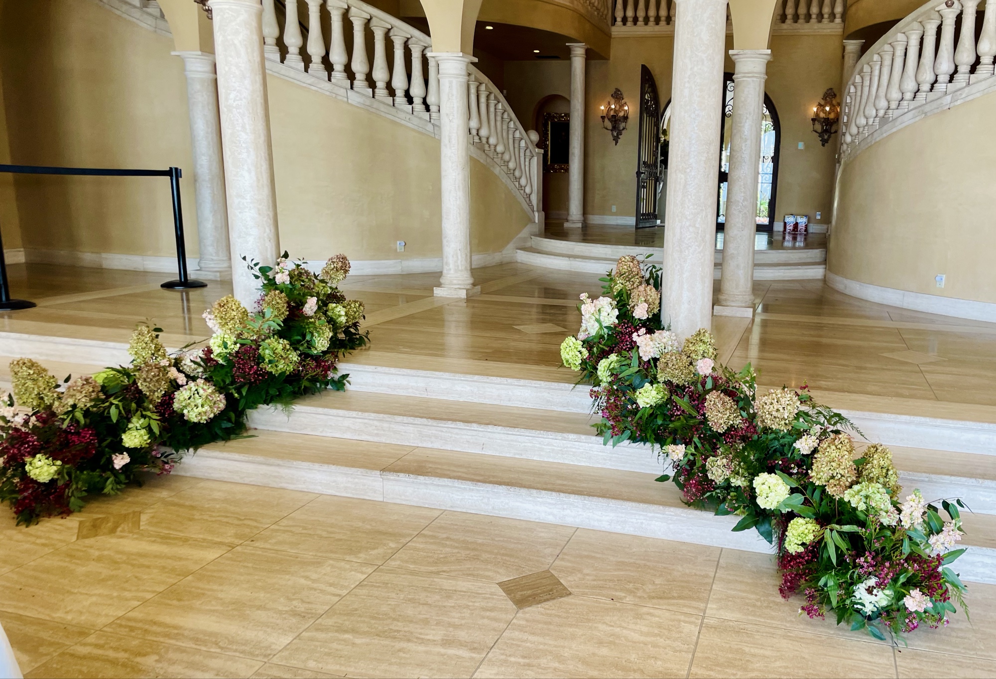 Grand staircase floral installation