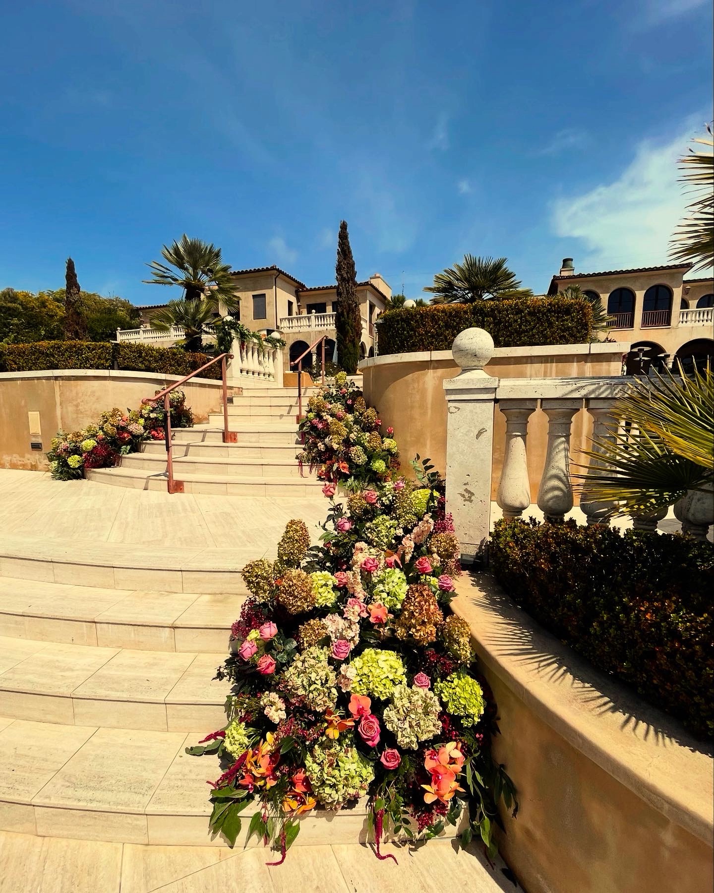 Outdoor staircase floral installation